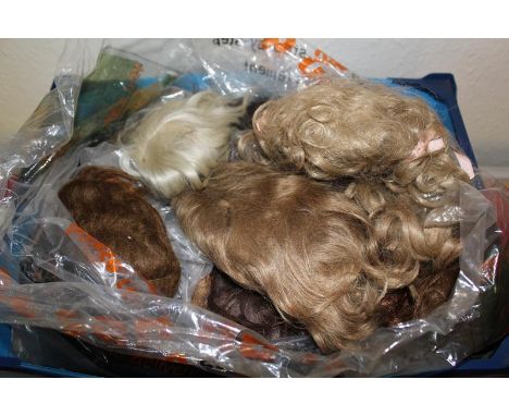 A large collection of Antique, Vintage and Modern dolls wigs, all colours, all sizes. (qty)
