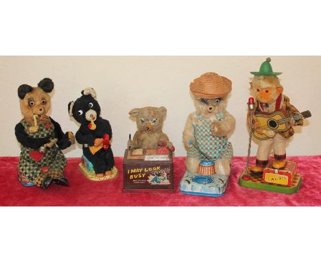 Five vintage Battery Operated Tin Toys. Including "I am the Boss"," I may look, busy but I'm confused," plush Teddy Bear at a