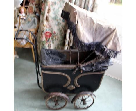 Buoyant as air, R. Kiddle & Son House Furnishers, St Ives, Hunts, 1930's dolls pram. With black painted wooden body, black re
