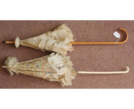 Two Victorian ladies parasols. Including a fine marked Sangters, with bone stick and handle, that has a folding stick, with f