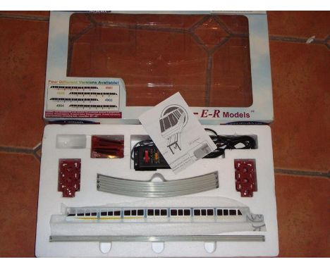 An HO Scale 7 car Monorail train set by E-R Models, original US controller replaced with a Hornby UK controller - VG-E in G-V