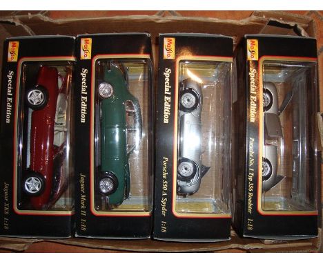 A group of 1:18 scale mint boxed diecast cars by Maisto - VG-E in G-VG boxes (4)