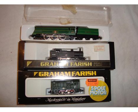 A group of N Gauge locomotives by Graham Farish to include an unboxed Merchant Navy and two other locos (boxed) - G-VG in G-V