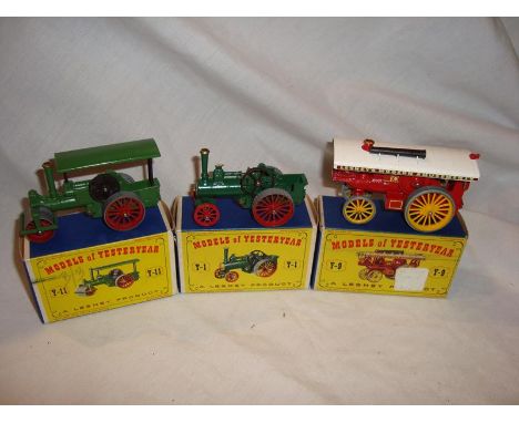 A group of three Matchbox Models of Yesteryear - a number Y1 Traction Engine, a Y9 Showman's Engine and a Y11 Steam Roller - 