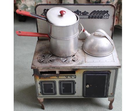 Mettoy, Made in Great Britian, 1950's, Tin plate, meths operated, child's toy cooker and pots, with a Chad Valley child's siz