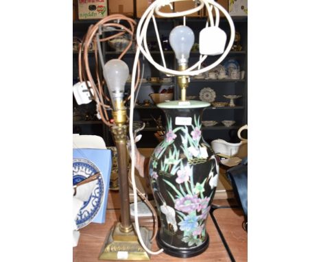 A Victorian Chinese lamp base having black ground decorated with stalks and lillies also heavy cast column lamp