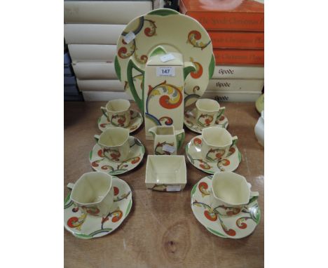 A Royal Doulton 'Syren' part coffee service comprising of sandwich plate, coffee pot,creamer,sugar basin and six cups and sau