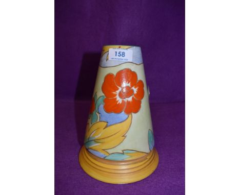 An art deco Shelley vase having bright orange Hibiscus like pattern with blue accents on mint green and yellow ground.