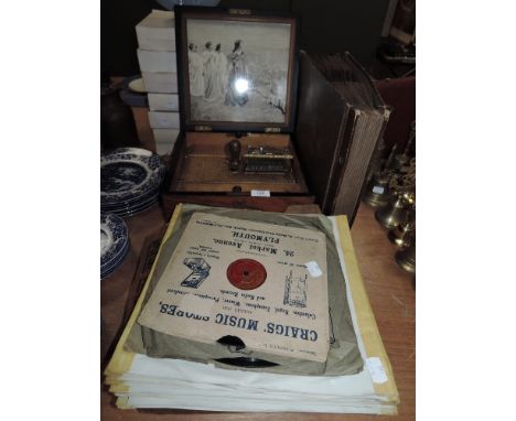 A large Edwardian wooden Polyphon music box and 20 discs,also included is a selection of shellac 78s.
In good working order. 