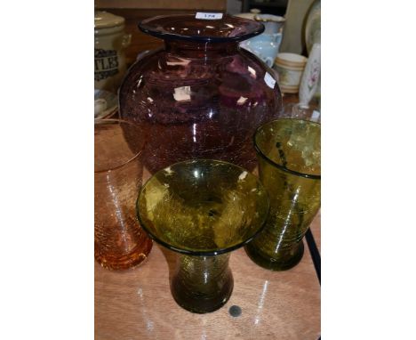 A collection of vintage crackle glass including large amethyst coloured vase and smaller ones in green and apricot.