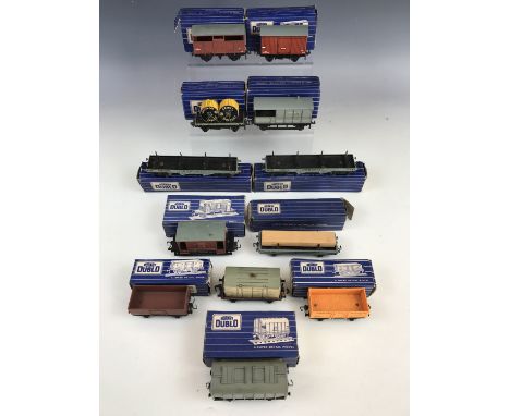 Twelve items of boxed Horny Dublo electric OO gauge model railway rolling stock, including a SD6 U.6.B sand wagon, a SD6 eigh