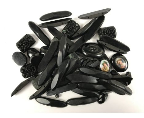 A quantity of late 19th Century loose jet beads, including a pendant with inset printed portrait miniature