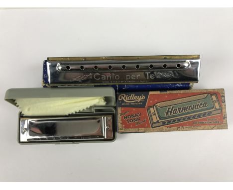 A Ridley's Honky Tonk harmonica and a Canto per Te harmonica