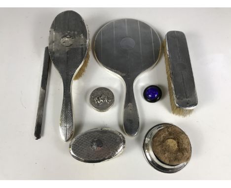 A silver-mounted and guilloche engraved dressing table set together with a silver-mounted pin cushion (a/f) etc