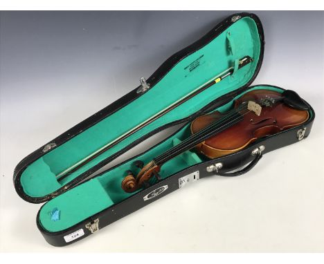 A cased Lark violin and bow