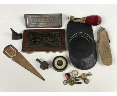 Sundry collectors' items including a 1933 Chicago bookmark, a pill spinner, a compass, pocket watch keys and a The Camden Whi