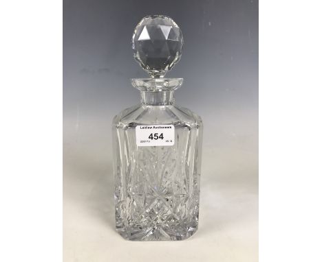A cut crystal decanter