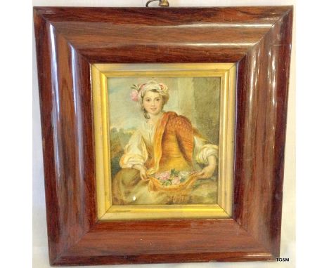 A small portrait of a young lady in rosewood frame