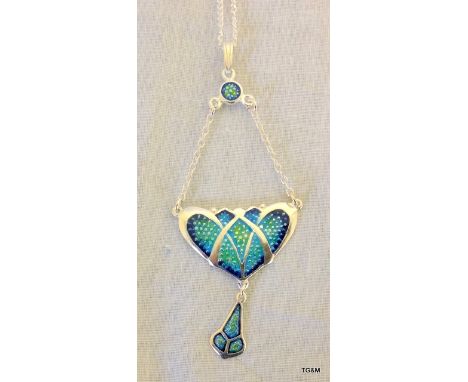 A silver and enamel set pendant necklace