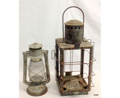 A German vintage signal lamp and a paraffin hurricane lamp 54 x 23 x 23