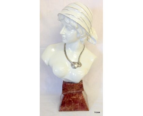 A Large Art Deco style ceramic bust of a young lady