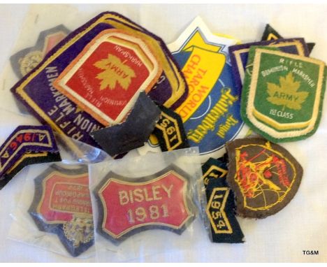 25 cloth and bullion wire shooting badges from the 1940s through to the 1980s from Bisley and the Canadian Army