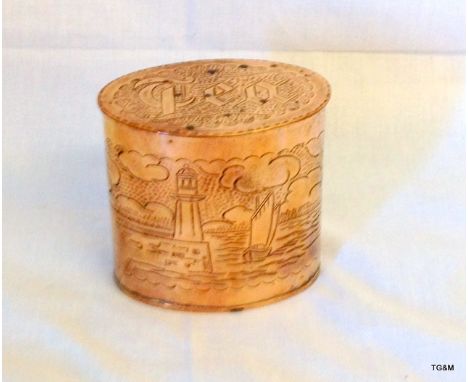 An Arts and Craft Copper tea caddy by Herbert Dyer with embossed decoration