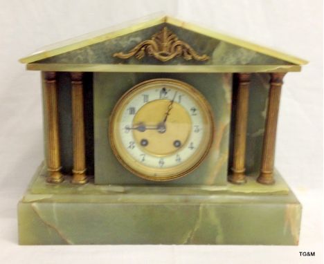 A 19th century green onyx mantle clock 