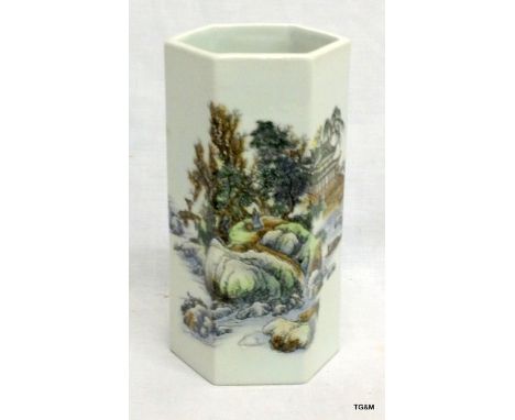 A Chinese porcelain brush pot with enamel decorated scene 19cm high