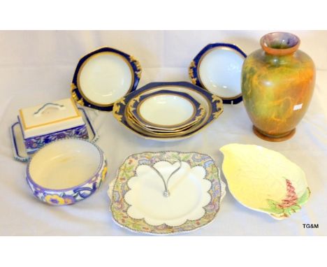 An assorted China including Poole Pottery, Carlton ware, Wilkinson Oriflamme vase and others