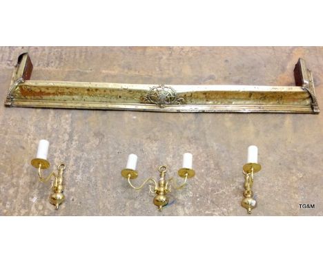 An early brass fire fender and 3 brass light sconces