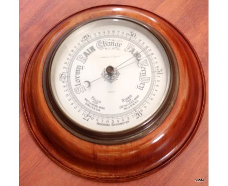 A Mahogany cased circular aneroid Barometer By H.Pidduck and sons - Hanley