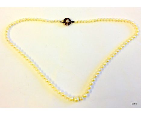 A cultures pearl necklace with a 9ct gold clasp
