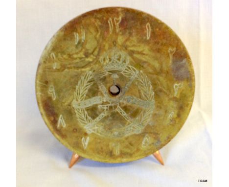 A Sultanate of Oman mantle clock made from a brass shell case 15cm diameter. No movement