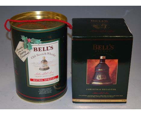 Four Bell's Christmas scotch whisky decanters, for the years 1989, 1990, 1991 and 1992, each boxed, 70cl and 40% (4)
