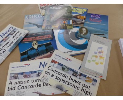 Concorde Original Adverts, Books &amp; Ephemera	A folder containing 28 Adverts with Concorde Interest, 3 Issues of British Ai