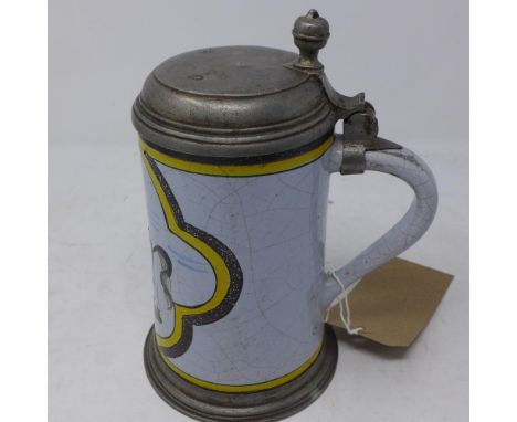 A 19th century German ceramic and pewter mounted tankard, with makers stamp to lid, H.22cm 