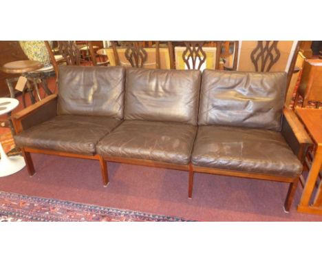 Niels Eilersen, a mid 20th century Danish rosewood three seat sofa, with black leather cushions 