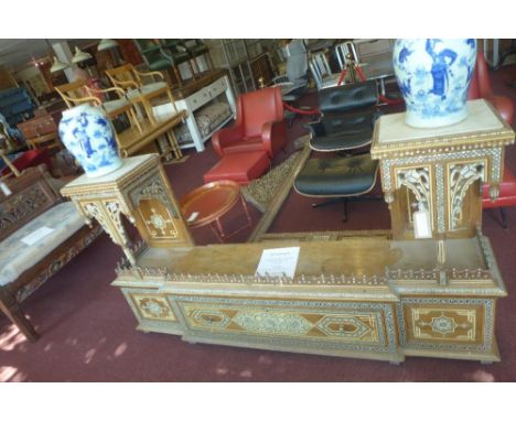 A large and impressive Syrian hardwood mirror frame on stand, with mother of pearl, ebony and ivory inlay, the base with two 