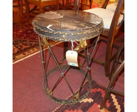 A 20th century Regency style wrought iron lamp table, with marble top and cross arrow supports, H.58cm Diameter 41cm 