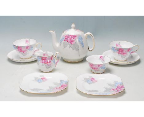 &nbsp;A vintage Art Deco 1930's Shelley bone china tea set / service / tea for two breakfast set being printed with a blue an