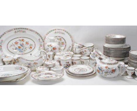 An extensive Wedgwood Kutani crane dinner and tea service consisting of dinner plates, side plates, bowls, tea pot, coffee cu