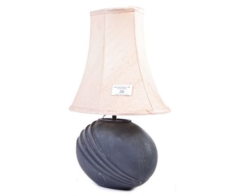 Sonja Ingegerd Andersson - SIA Pottery - A Swedish contemporary lamp of ceramic construction. The pebble shaped black ground 