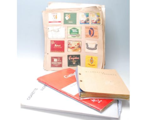 A collection of vintage Cigarette packets / cut outs stored within multiple albums. Packets include Park Drive, Player's Navy
