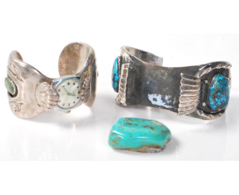 Two pieces of silver white metal Native American Navajo jewellery to include a bangle set with a large turquoise stone flanke