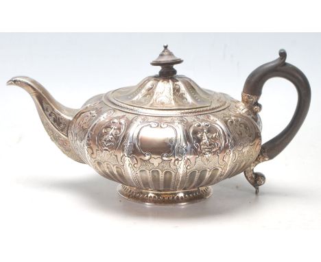 A 19th Century&nbsp;William IV silver hallmarked&nbsp;John, Henry &amp; Charles Lias tea pot having a sectional body with rep
