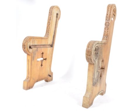 A pair of early 20th century unusual anglo-colonial church pew bench ends. Each of hardwood construction with carved roundel 