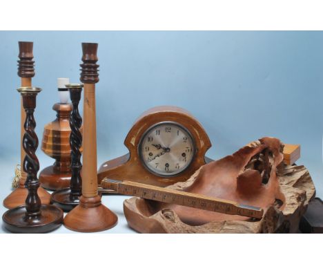 A collection of mid-century woodenware to include a pair of mahogany tall twisted candlesticks, Rabone Chesterman ruler, Edwa