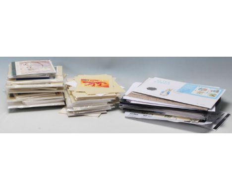 A collection of Royal Mail 21st century First Day Of Issue Covers, together with a wide selection of Royal Mail stamp postcar