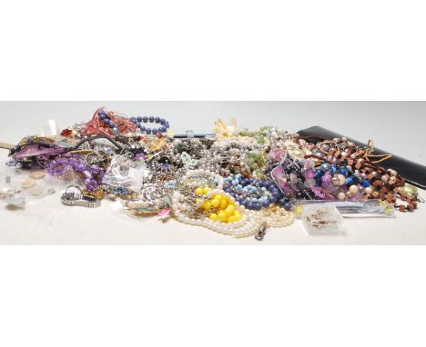  A large collection of Costume jewellery to include bracelets, rings, necklaces, brooches, scarf clips from Pia, Eternal Coll